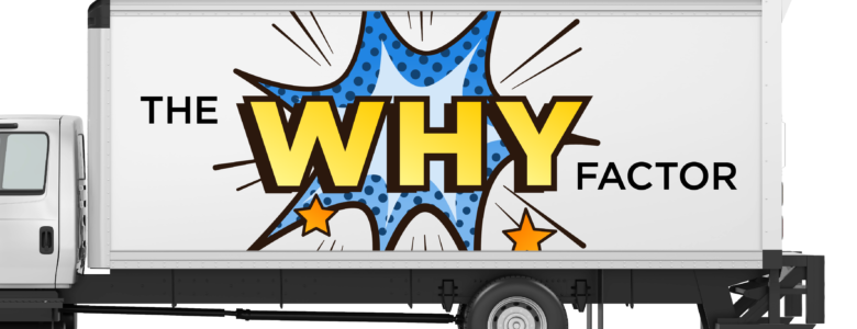 truck facing to the side with the why factor on trailer